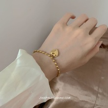 韩版新品钛钢手链女心形米粒金色百搭防褪色简约气质吊牌手饰钢饰