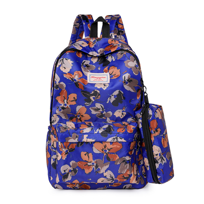 Trendy Waterproof Graffiti Printing Large Capacity Backpack 2023 New Simple School Bag for Junior and Senior High School Students