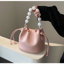今年流行超火小包包女2024新款潮百搭链条包珍珠手提包斜挎水桶包