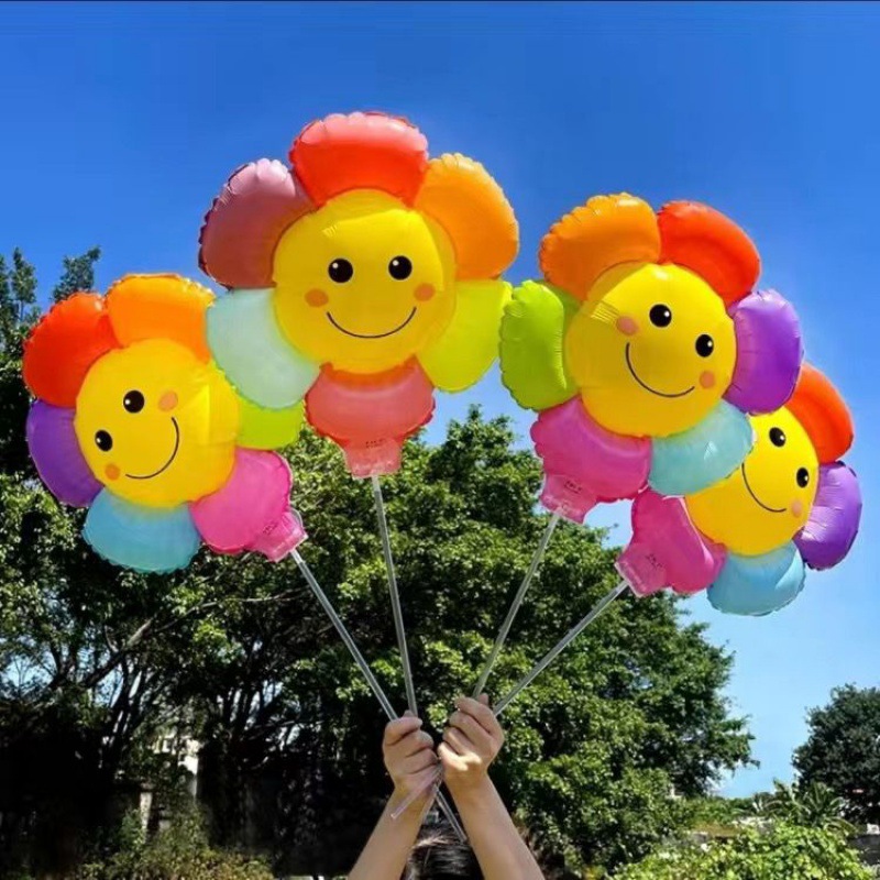 太阳花气球批发摆地摊七色花笑脸带托杆引流小礼品网红气球-阿里巴巴