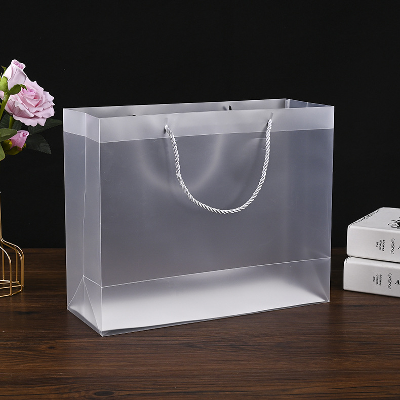 现货pp透明磨砂手提袋塑料服装pvc购物袋空白手提塑料袋加印logo