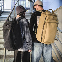 双肩包户外旅行水桶背包帆布登山运动男驴友超火个性大容量行李包