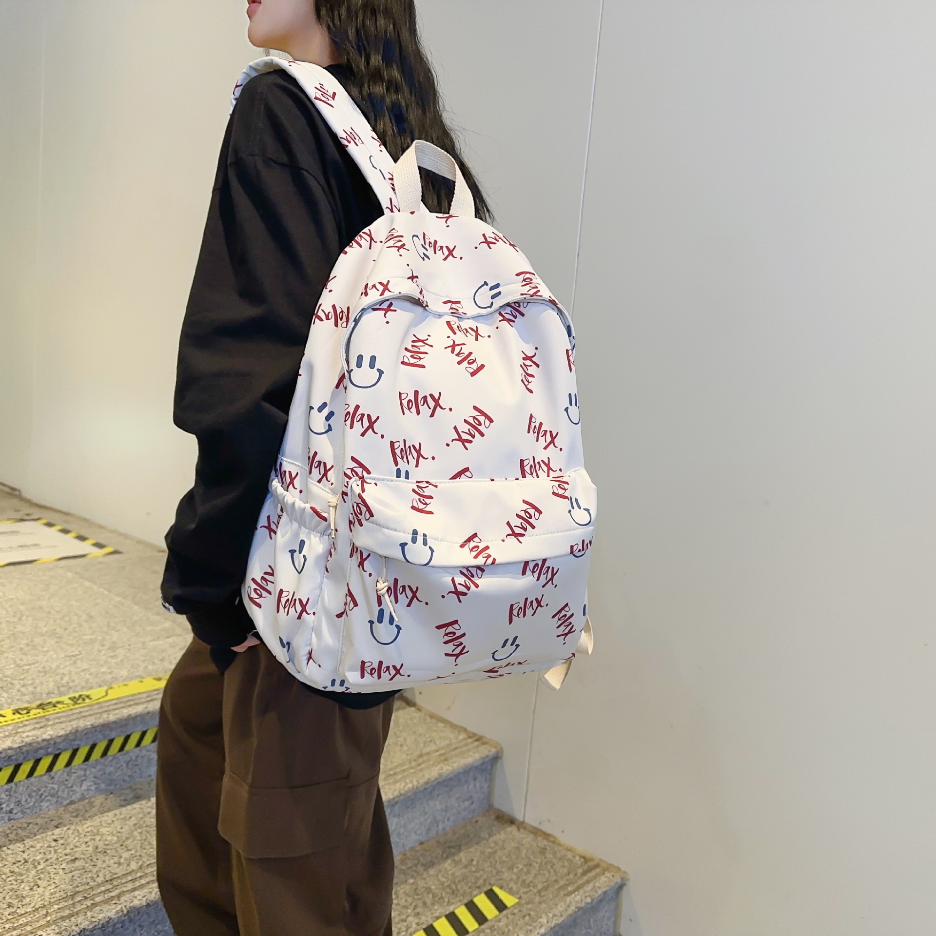 小清新少女双肩包韩版新款潮小众文艺字母笑脸书包学生旅行背包女