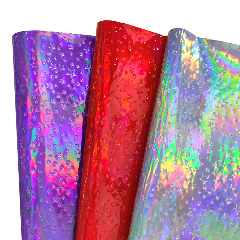 幻彩金属压纹大小星星pu革炫彩镭射镜面装饰化妆收纳箱包手袋面料