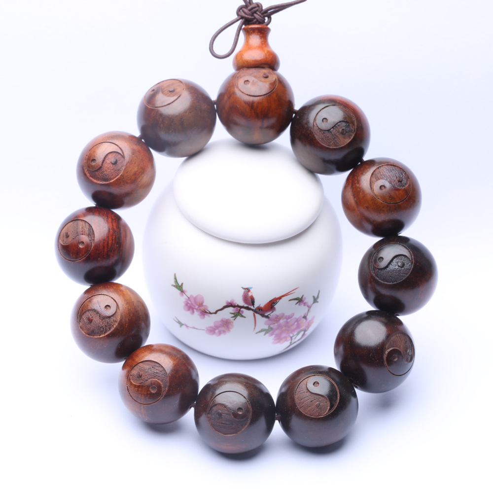 0 kg单位重量0.03 kg产品介绍选用越南红木红酸枝制作小孔