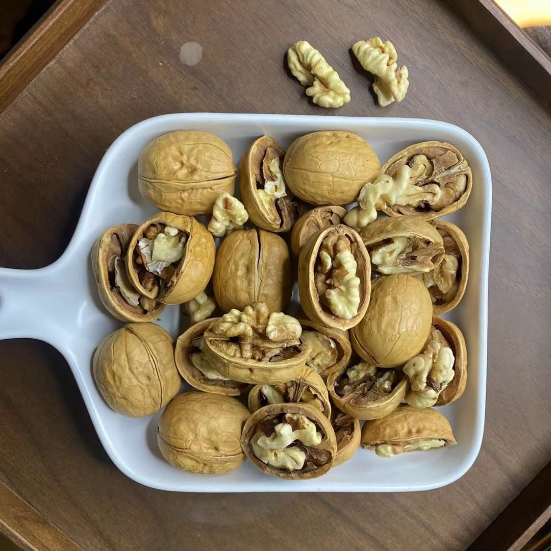五香核桃薄皮奶香半籽五香烤核桃500g净重新疆薄壳纸皮奶油特产坚