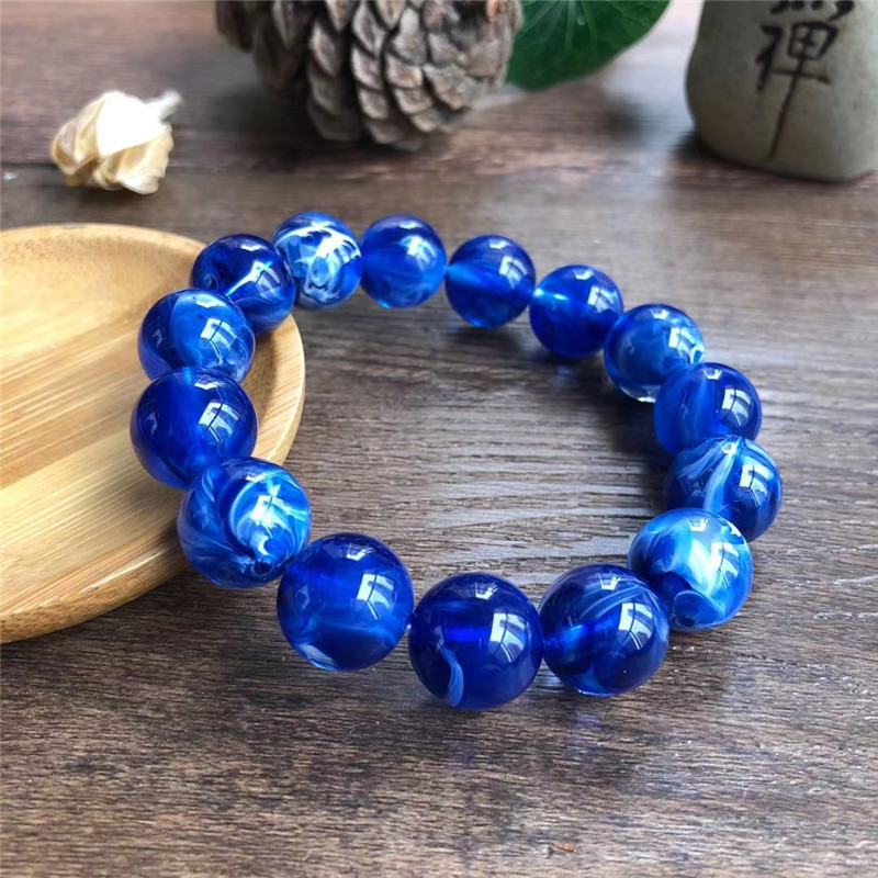 严选仿二代合成琥珀蓝蜜蜡手串蓝精灵单圈手串浮盐水荧光男女手链