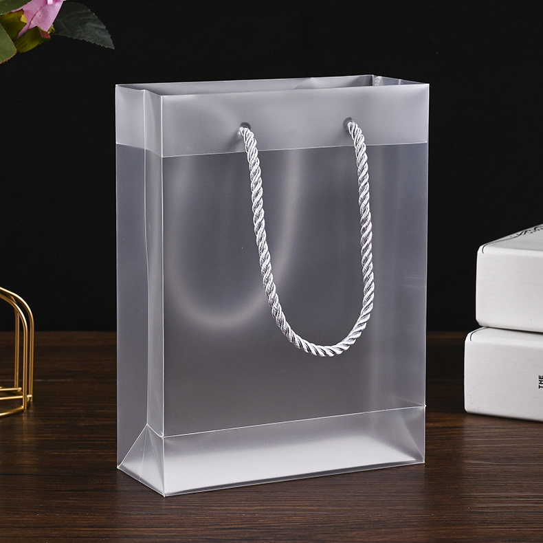 现货pp透明磨砂手提袋塑料服装pvc购物袋空白手提塑料袋加印logo