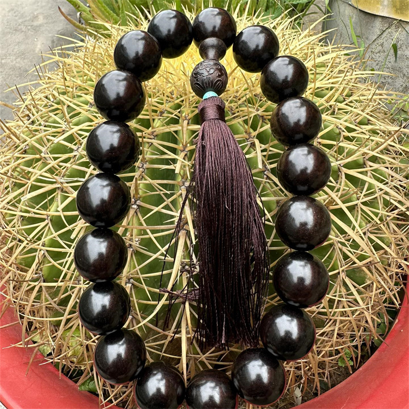 非洲紫光檀老料沉水黑檀乌木珠车挂原木手持文玩收藏手挡珠批发