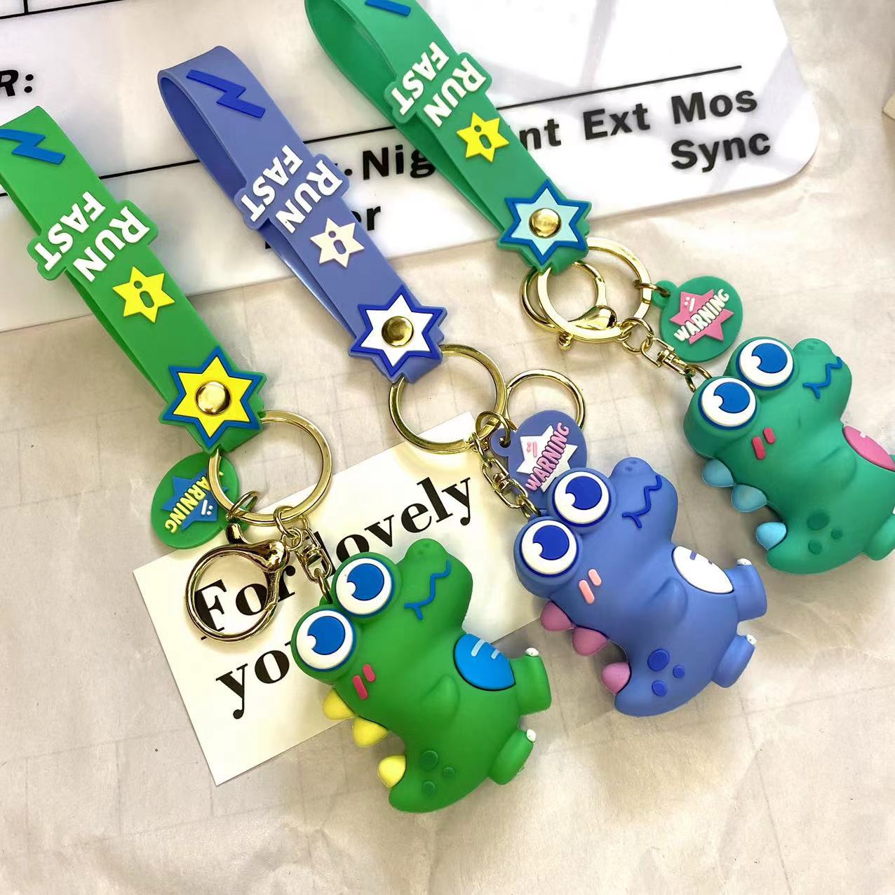 New Cartoon Big Eye Little Dinosaur Keychain Lovely Bag Pendant Car Key Chain Couple Small Gift Wholesale