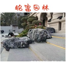 重庆黑石头产地 33吨黑山石装车出货 别墅区的庭院鱼池黑山石假山