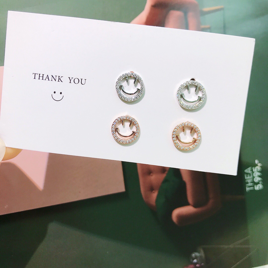 通体纯银s925小巧精致镂空笑脸锆石耳钉高级感气质百搭耳饰女批发