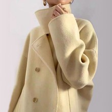 2023冬季新款时尚气质鹅黄色高龄双排扣长款双面呢羊毛大衣女