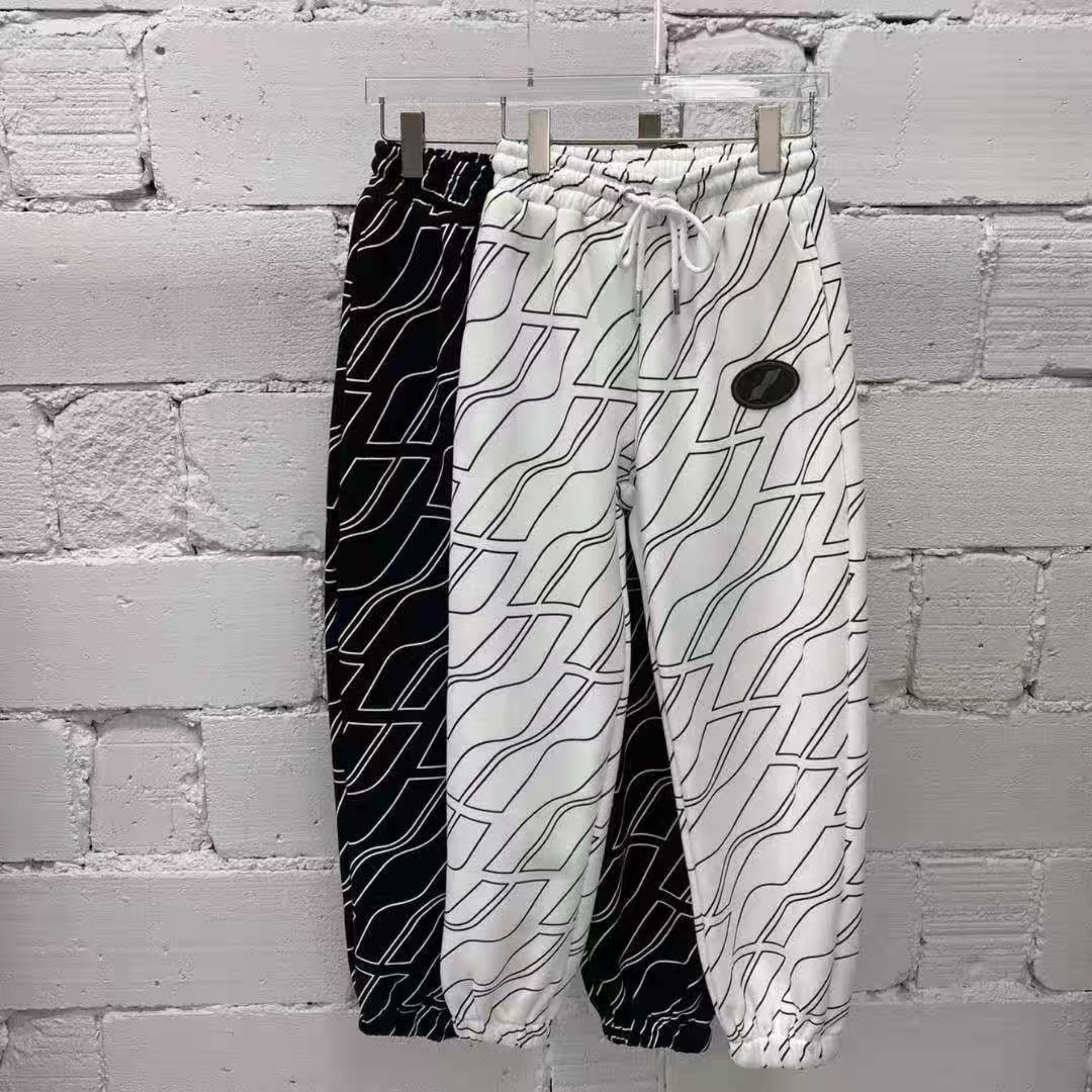 高版本新款we11时尚百搭宽松满印长裤男女情侣同款运动休闲裤t恤