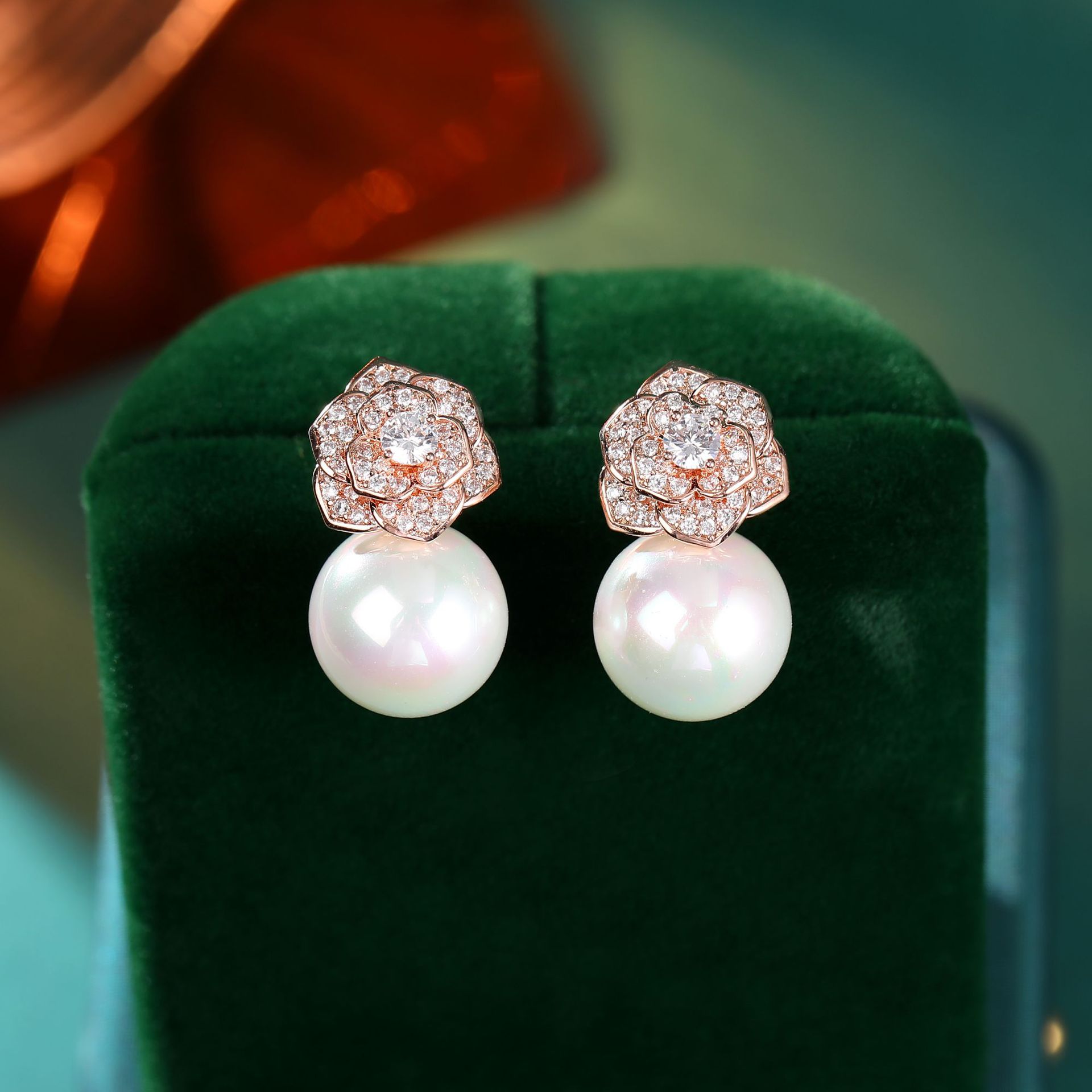 新款时尚珍珠耳环轻奢简约高档气质耳坠复古s925银针女山茶花耳钉