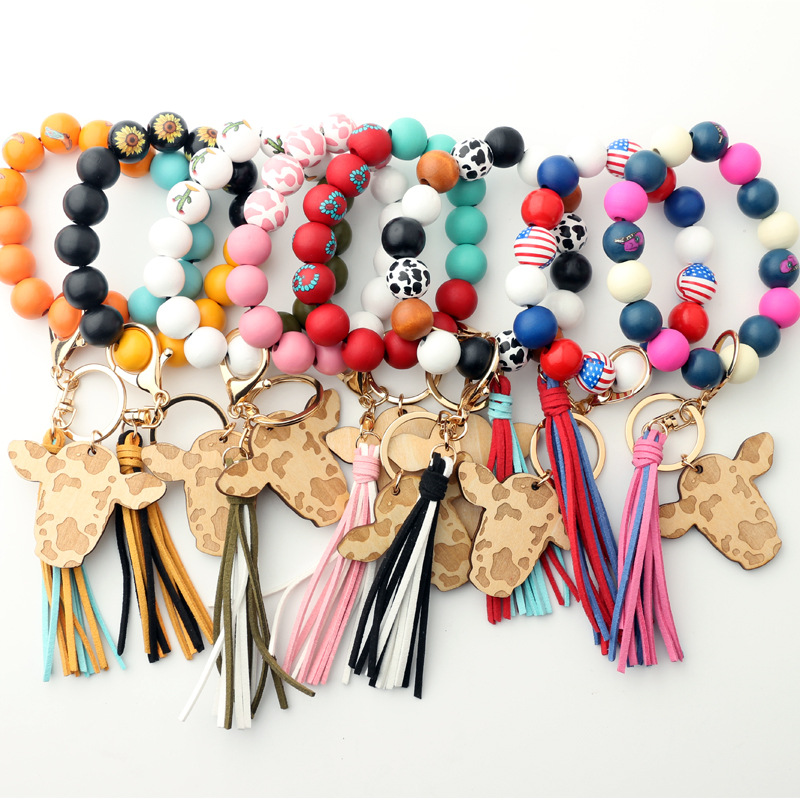 New Products in Stock European and American Ornament Tassel Pendant Western Cowboy Bracelet Cow Wooden Beads Bracelet Cow Head Keychain