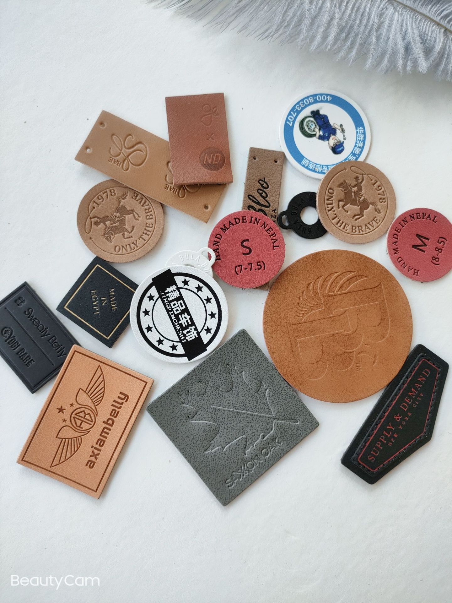 皮标皮牌pu圆形压花变色皮革箱包车饰服装皮牌真皮标小标压logo