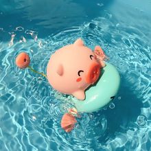 儿童发条小猪骑飞鱼婴儿拉线戏水鲸鱼恐龙骑飞鱼洗澡喷水游泳玩具