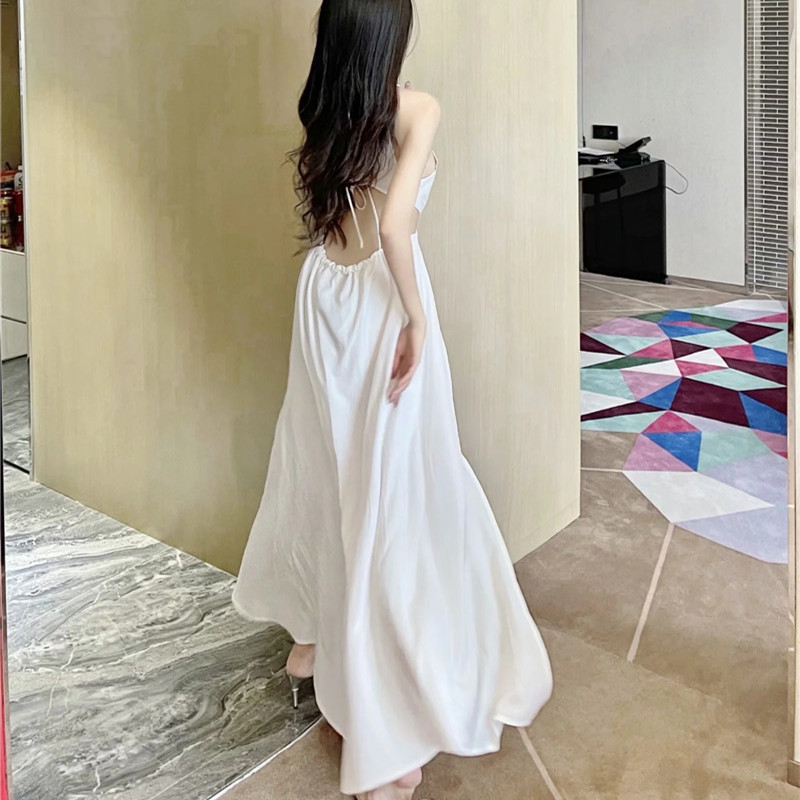 海边度假衣服吊带露背白色三亚沙滩裙夏超仙镂空露背长裙