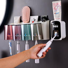 创意牙刷置物架漱口刷牙杯壁挂卫生间收纳自动挤牙膏器免打孔壁挂