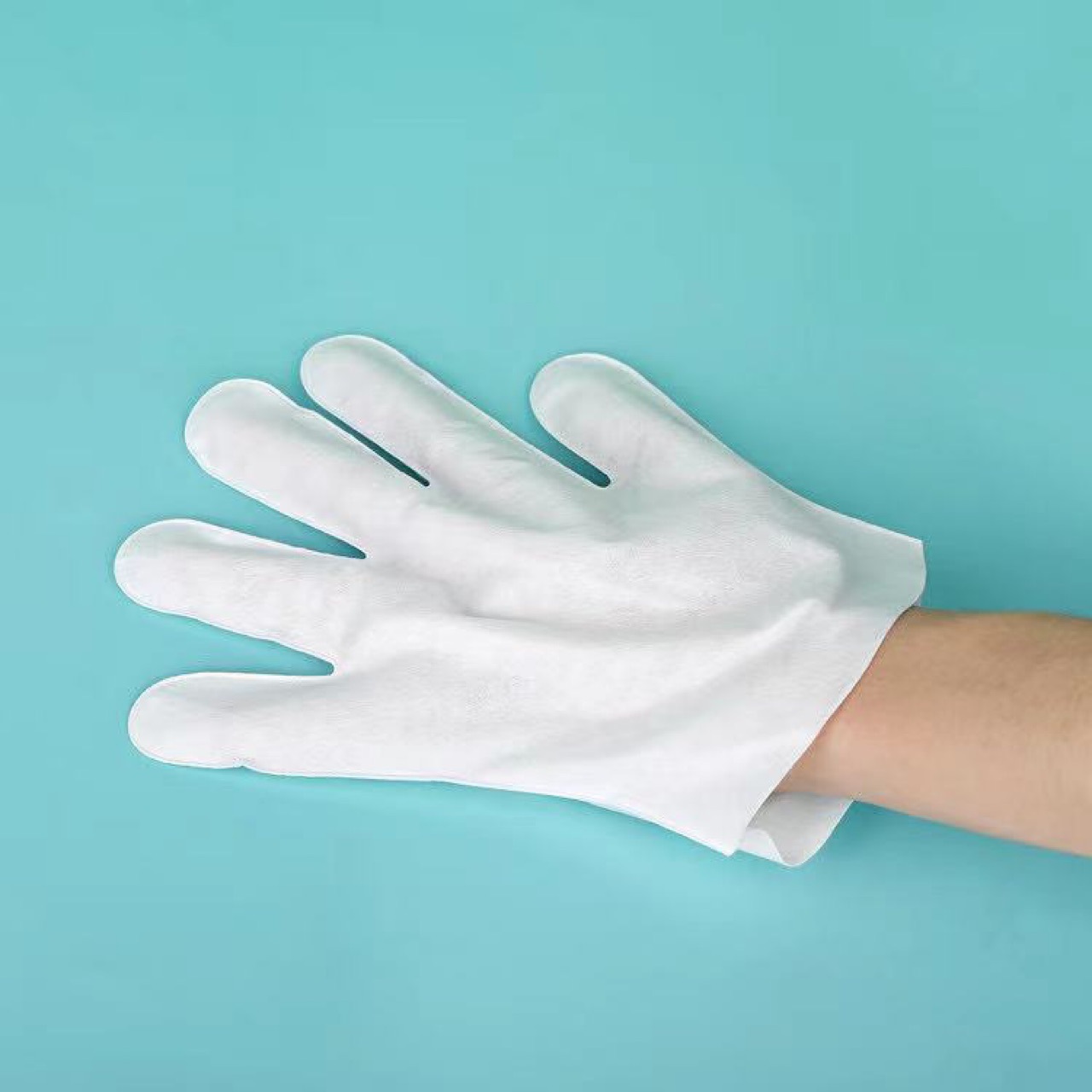 厂家批发一次性无纺布手膜手套,一次性宠物手套防护手膜护理手套