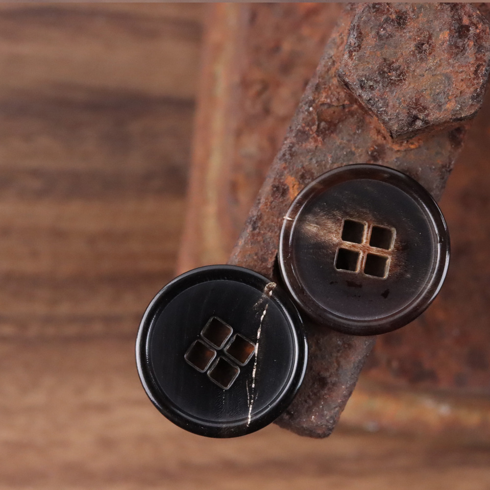 黑色真牛角扣西服四眼纽扣休闲风衣大衣外套钮扣高档外套衣服扣子