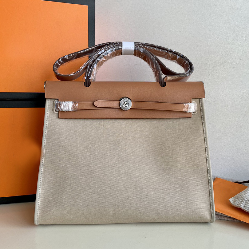 herbag 31cm19cm防水帆布拼牛皮单肩斜挎手提女包飞马铂金凯莉包