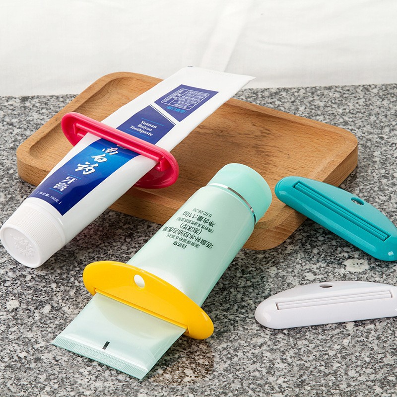 挤牙膏器牙膏夹子洗面奶护手霜挤压器手动挤压牙膏软管小样卷压器