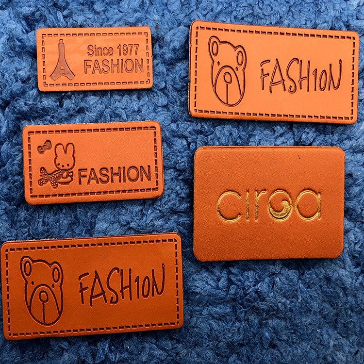 服装pu仿皮压印皮标 牛仔裤电压皮牌 压花印花烫金反光牛皮标