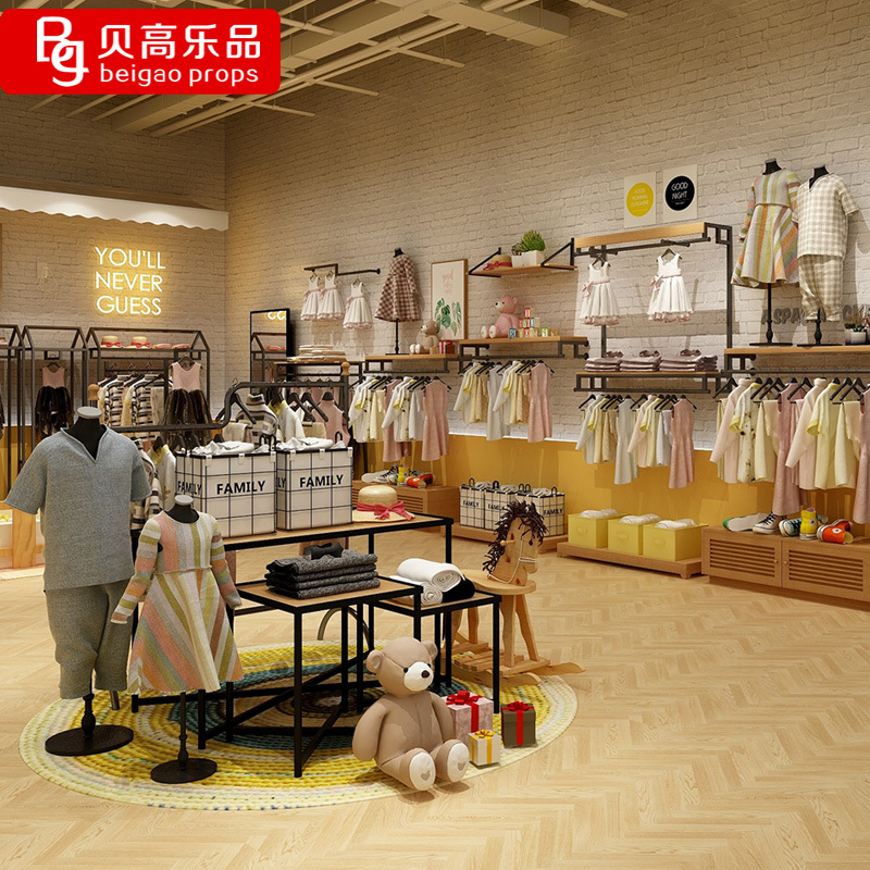童装店货架展示架上墙壁挂式儿童服装店铺落地式挂衣架装修效果图