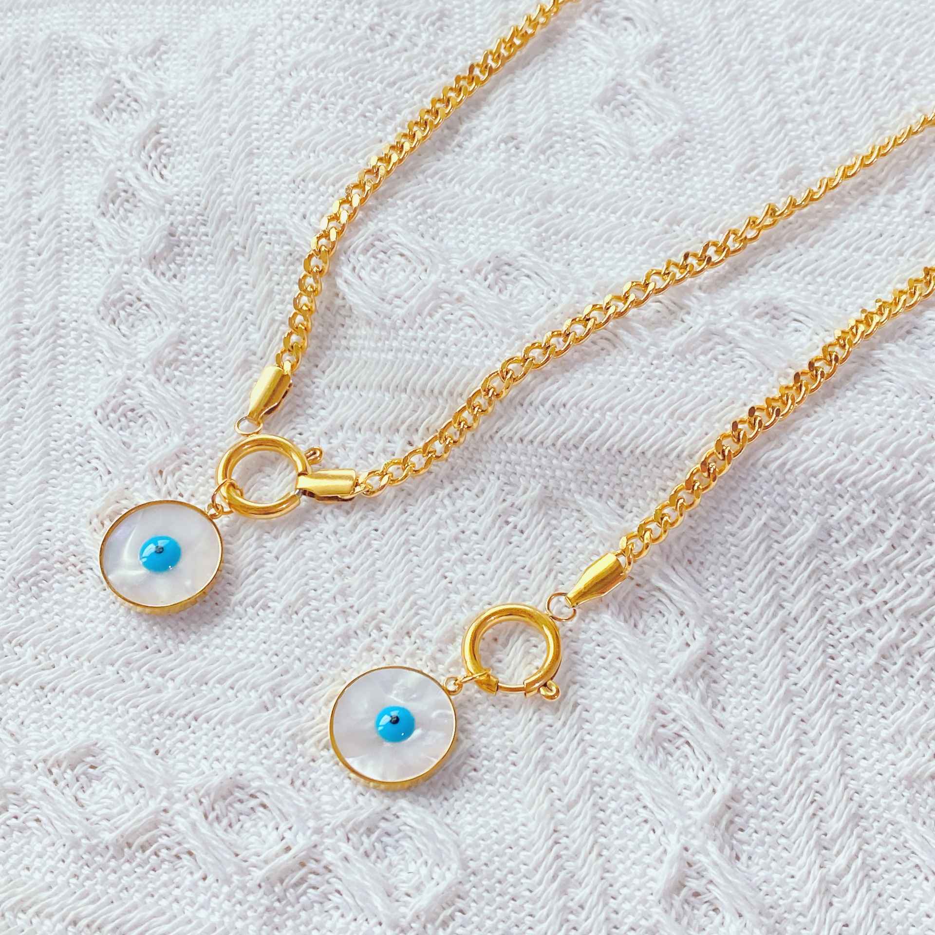 个性设计新款钛钢眼睛吊坠项链手链套装欧美时尚镀18k金潮流搭配