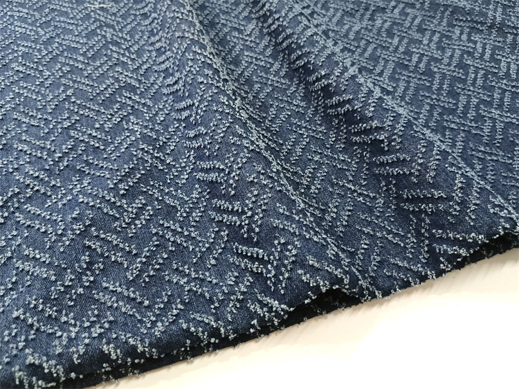 10安洗水冲孔牛仔布料菱形钩花面料服装裙子帽子鞋材箱包设计面料