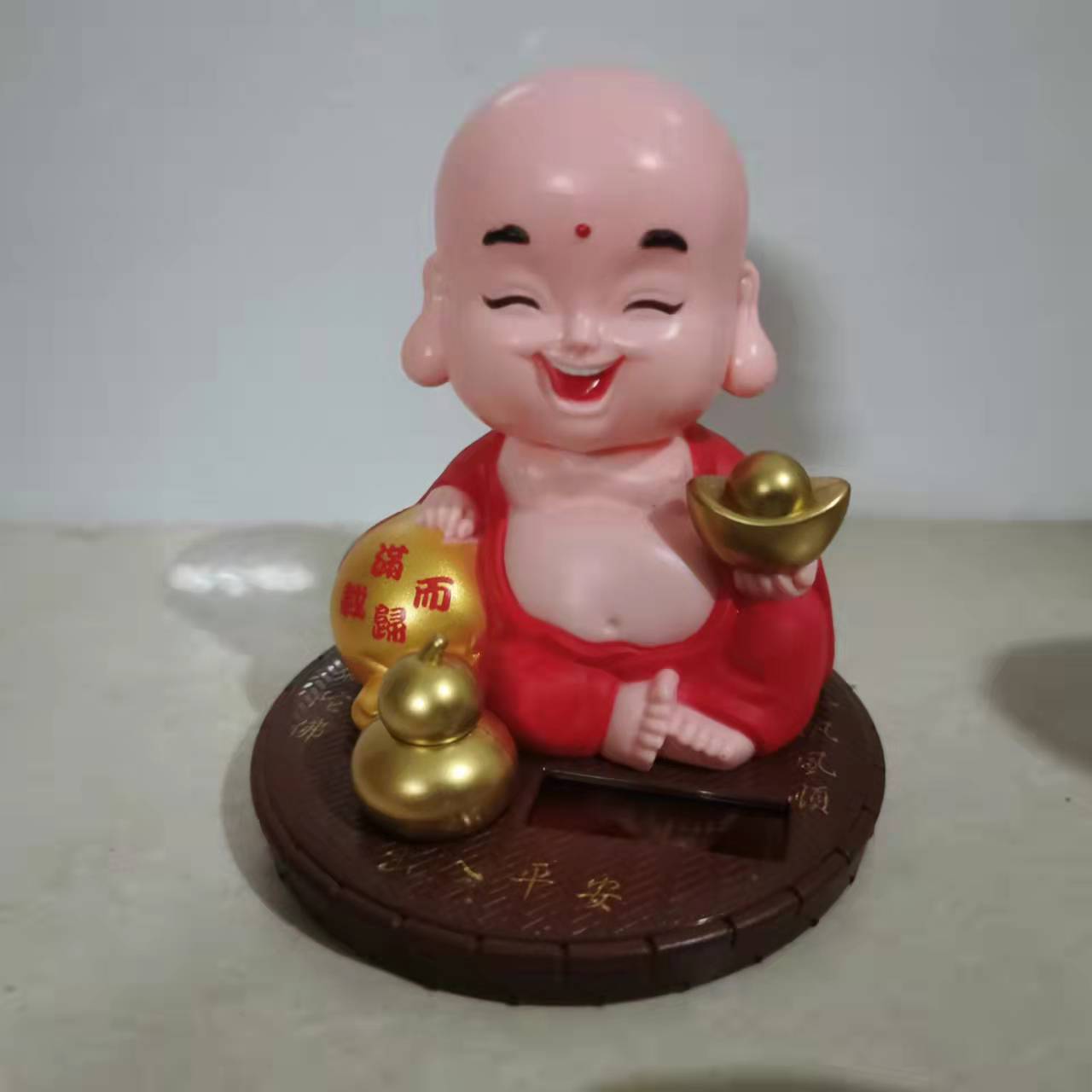 Solar Jinbao Shaking Head Smiling Buddha Creative Car Decoration Car Interior Decoration Supplies Wholesale