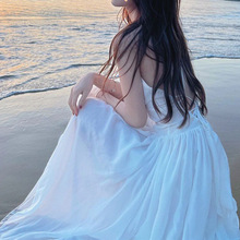 三亚旅游拍照衣服女海边度假沙滩裙超仙白色露背吊带连衣裙仙女裙