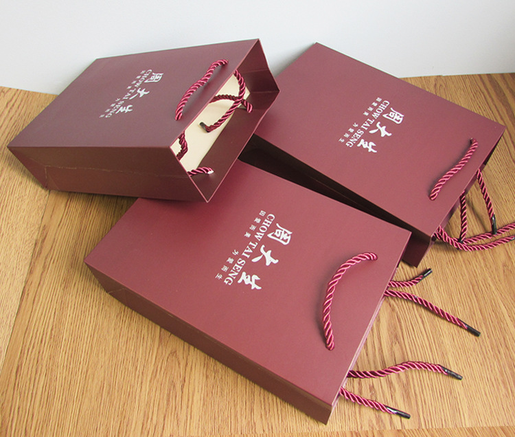 珠宝纸袋,磨砂纸袋,牛皮纸袋,中国珠宝手提袋,周大生珠宝包装纸袋