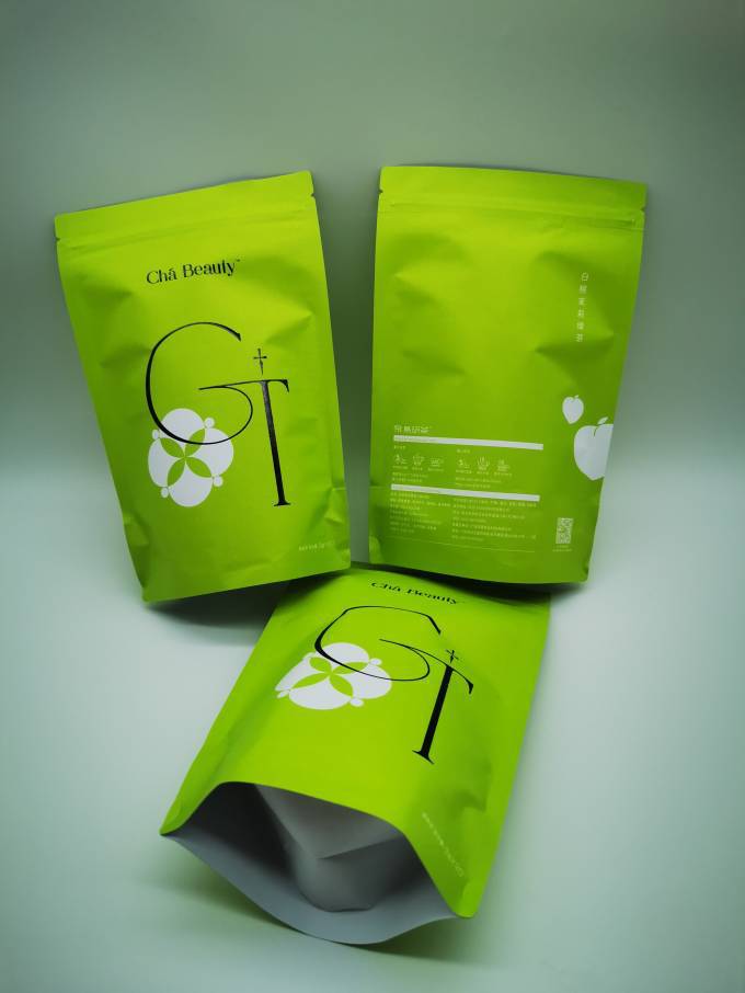 牛皮纸单色印刷烫黑金袋子茶叶包装袋自立袋带拉链免版费印刷