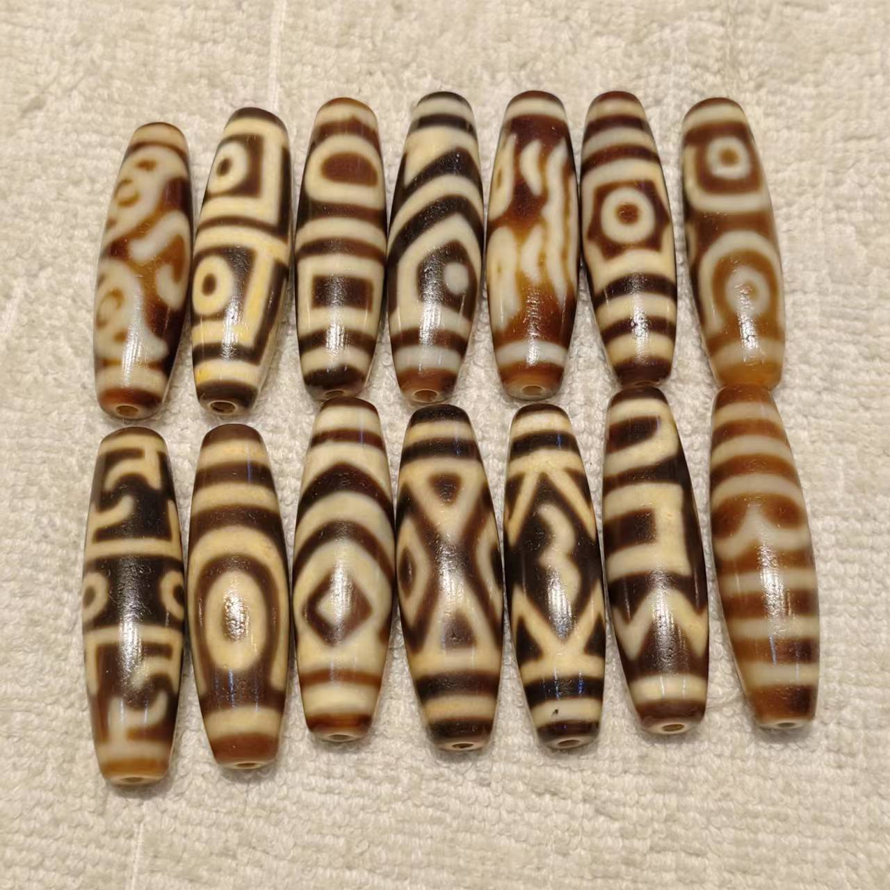 台工渗透高油细腻包浆风化玛瑙天珠项链吊坠diy配饰dzi批发-阿里巴巴