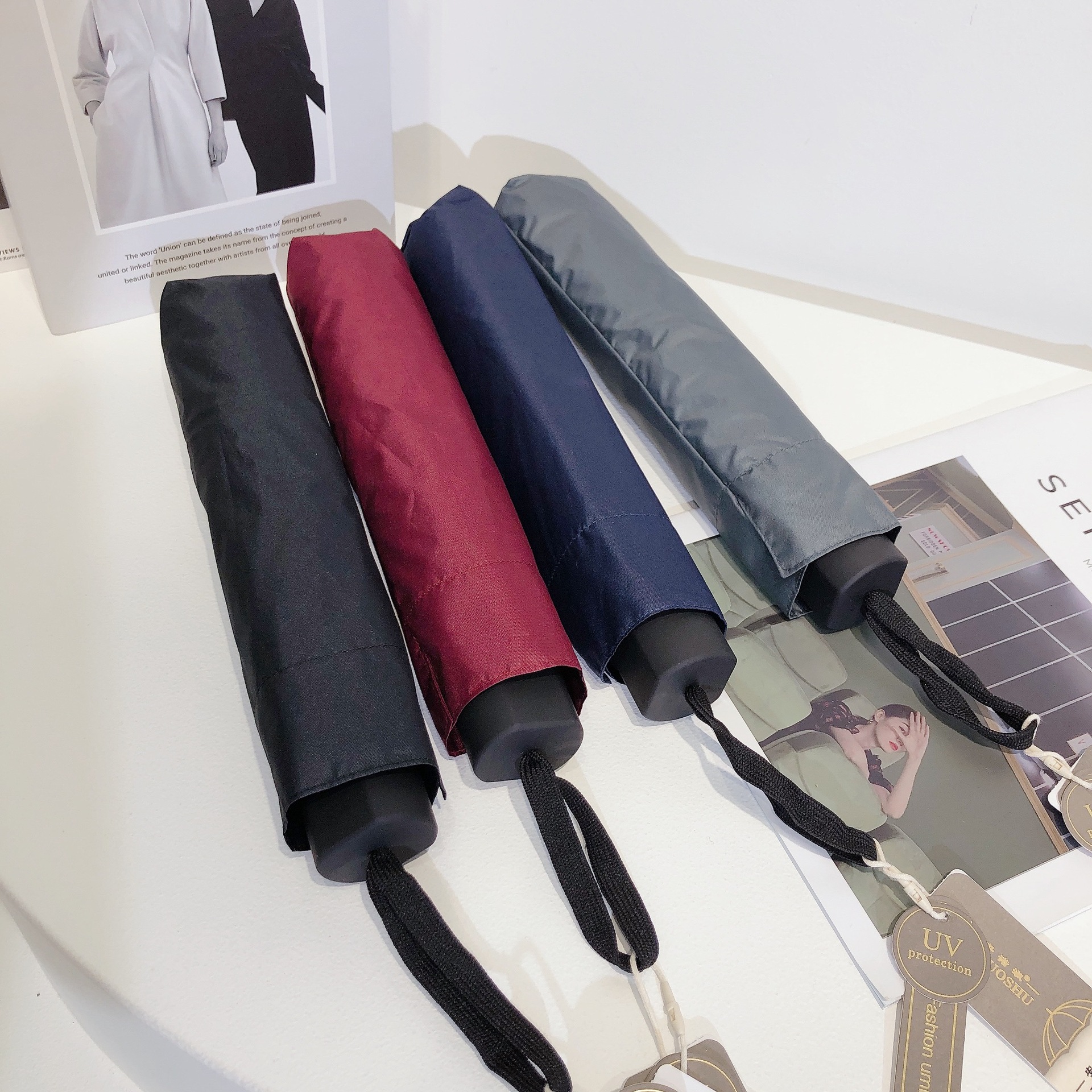 新款晴雨两用伞批发 10骨加大纯色黑胶防晒晴雨两用伞厂家供应