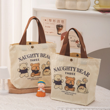 新款小熊帆布包百搭手提包女学生饭盒袋简约手提袋子上班族便当包