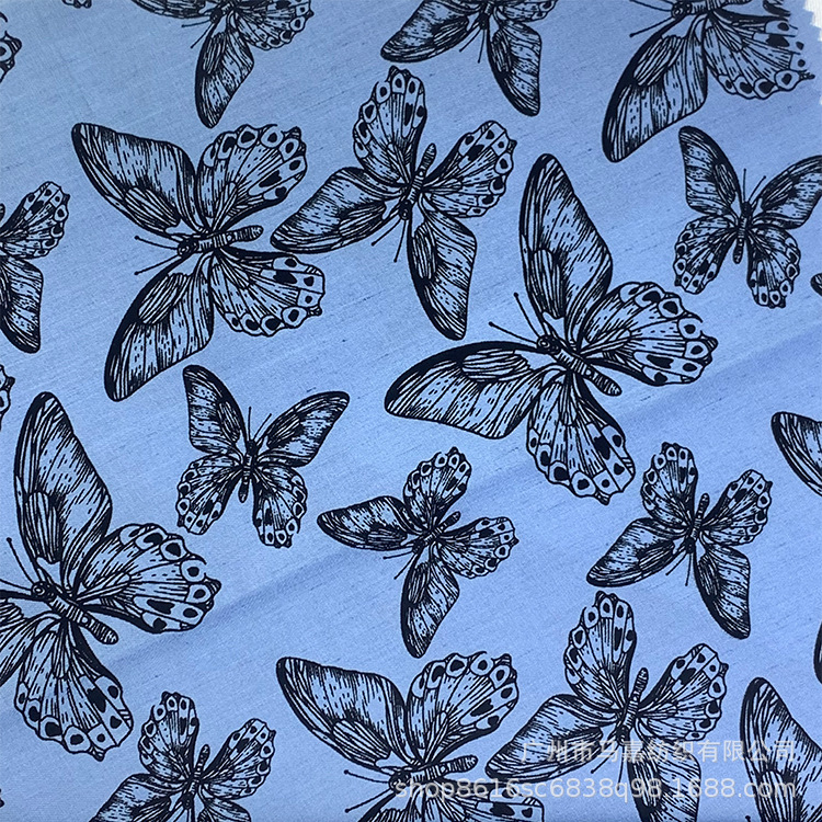 大量现货蝴蝶图案春秋薄款透气服装面料 5oz天丝印花牛仔印花面料