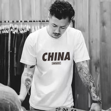 中国李宁男子20新款巴黎时装周宽松透气运动短袖t恤文化衫ahsq637