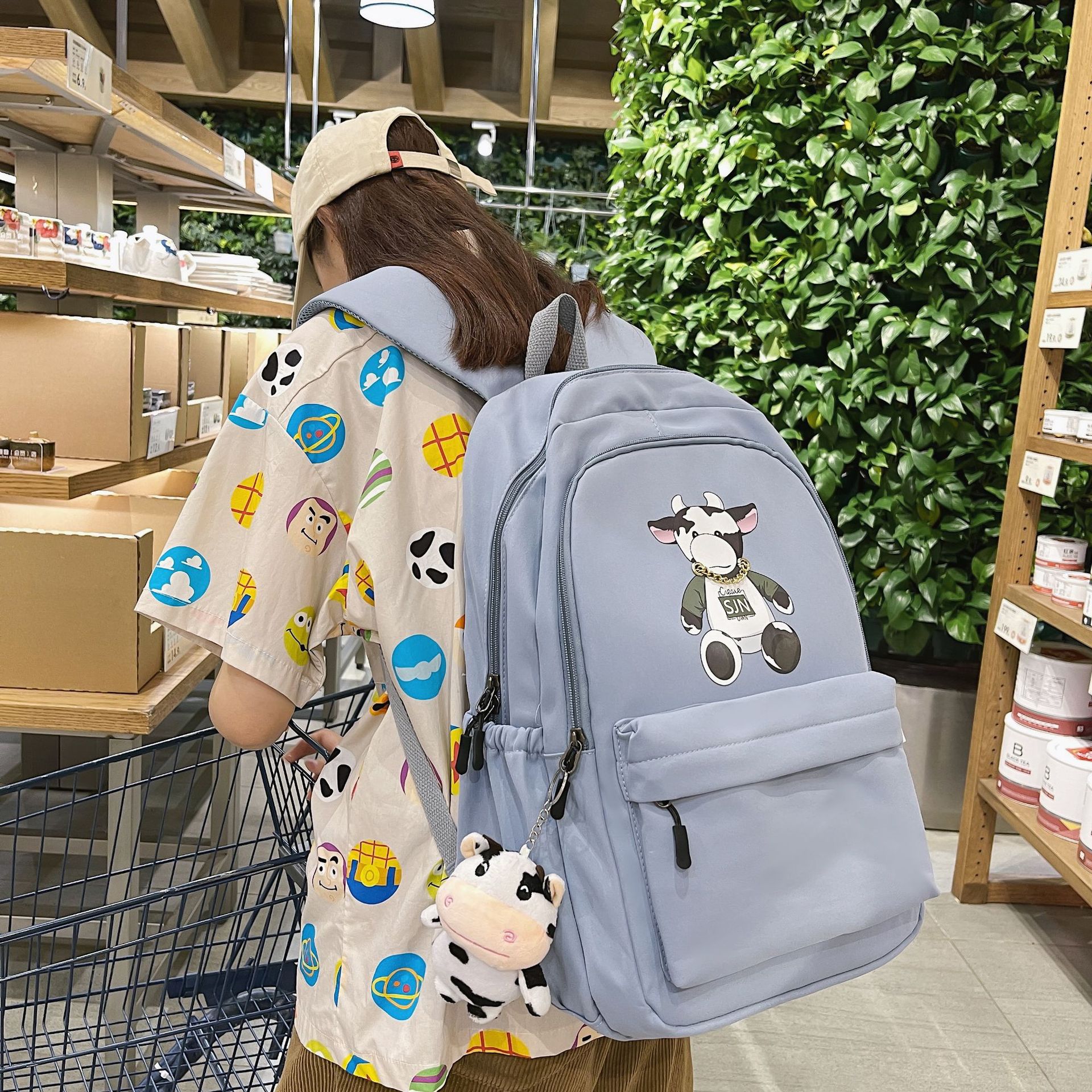 2022新款韩版学生双肩背女初中高中生书包学院风可爱印花小牛背包