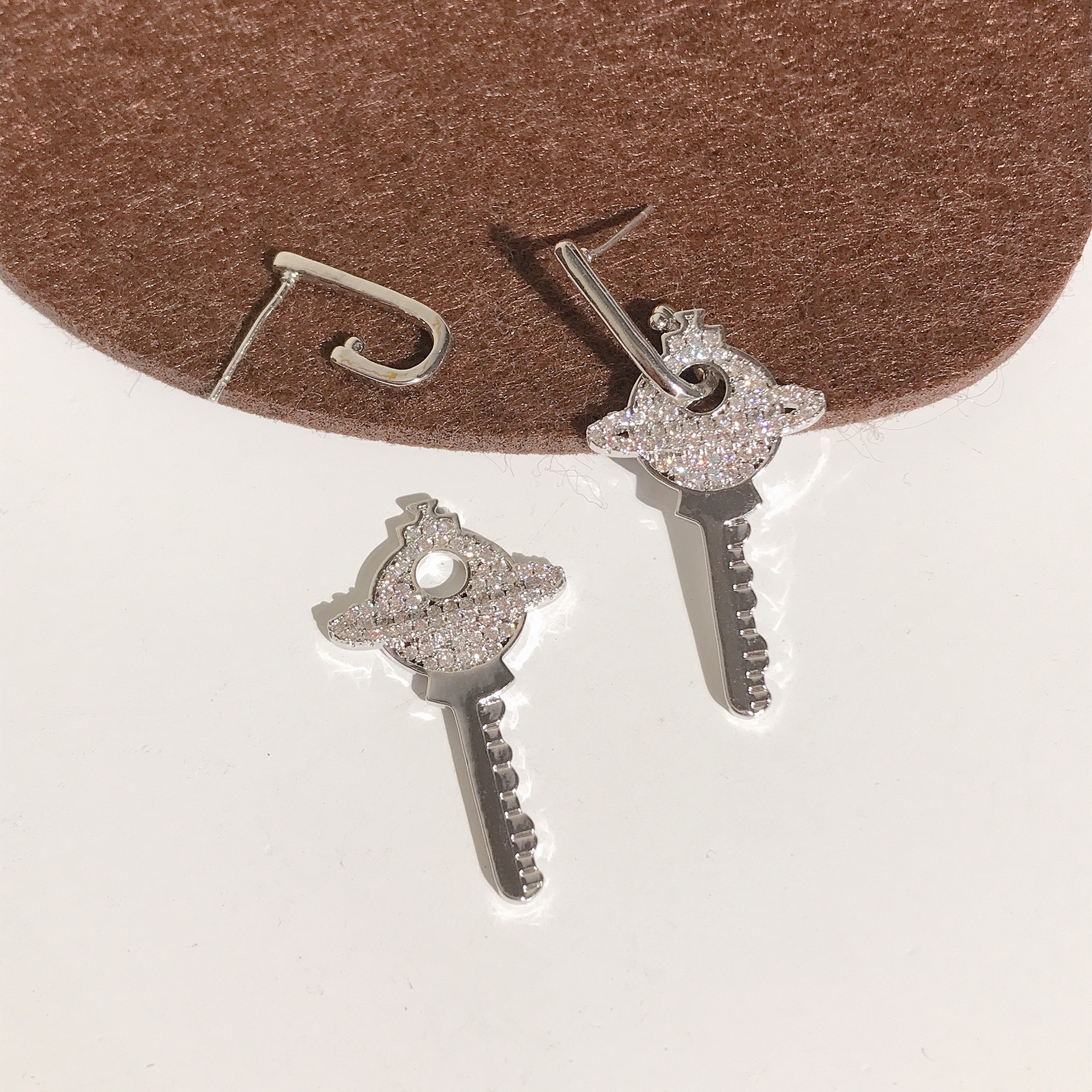 Earrings Wholesale Special-Interest Design Planet Key Earrings Cross-Border Light Luxury Zircon Earrings Silver Needle