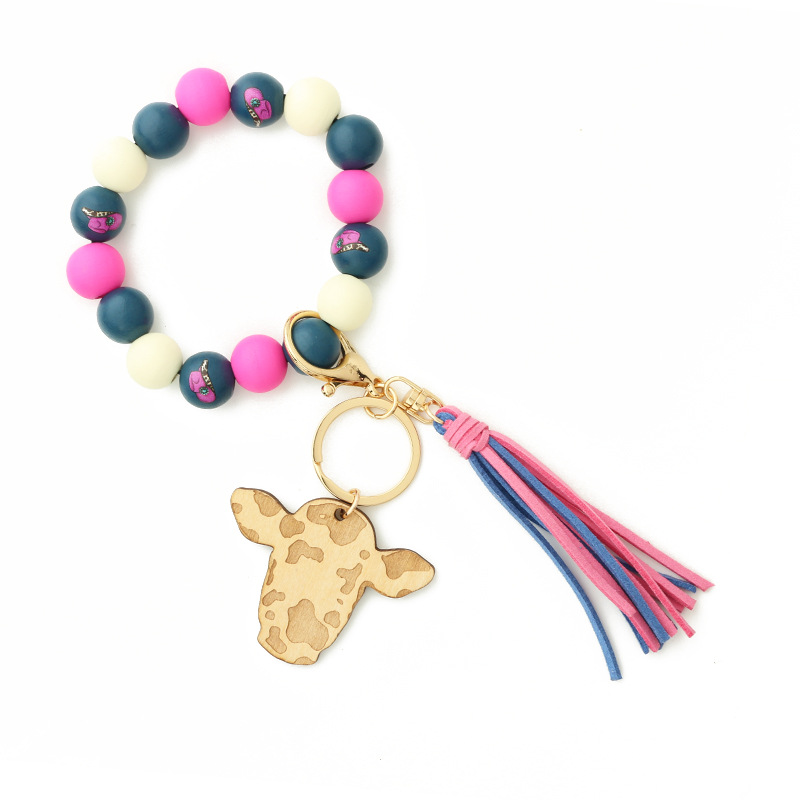 New Products in Stock European and American Ornament Tassel Pendant Western Cowboy Bracelet Cow Wooden Beads Bracelet Cow Head Keychain