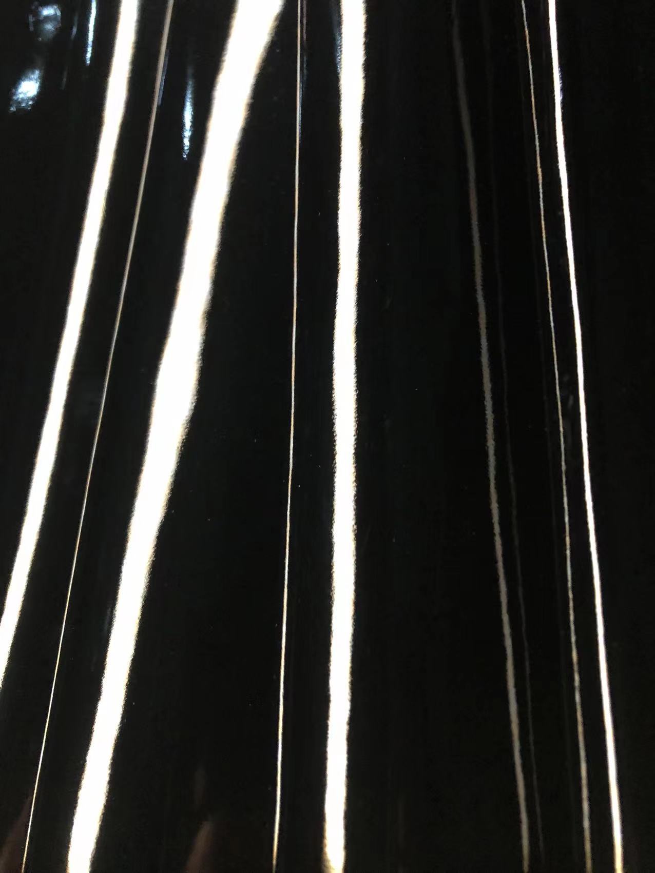 现货供应pu革黑色反光微弹无痕镜面0.7mmjc-1009 新款皮革面料