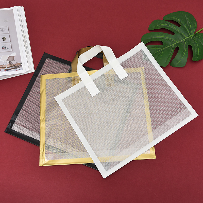 现货批发美妆手提袋网格透明塑料手提包装袋方底可降解新款袋子