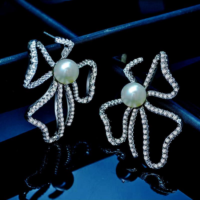 仙璨珠宝 2024新款s925银花形蝴蝶结耳钉通体银镶嵌天然珍珠-阿里巴巴