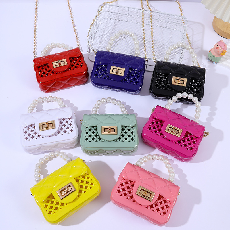 2023 Cross-Border New Arrival Handbag Fashion Pearl Hand Chain Portable Mini Crossbody Hollow Gel Bag