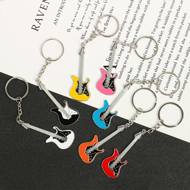 cross-border exclusive spot wholesale creative musical instrument pendant activity gift bag ornaments metal paint guitar keychain