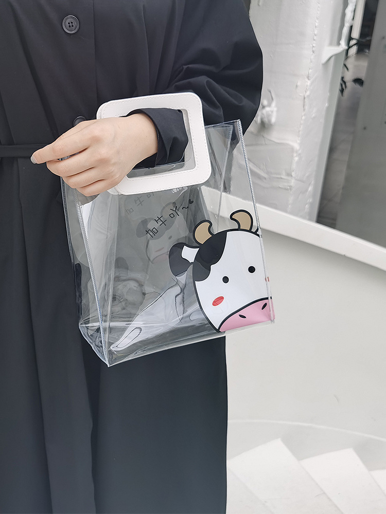 2021牛年礼品袋可爱新年手提袋子pc透明塑料果冻包网红送礼-阿里巴巴